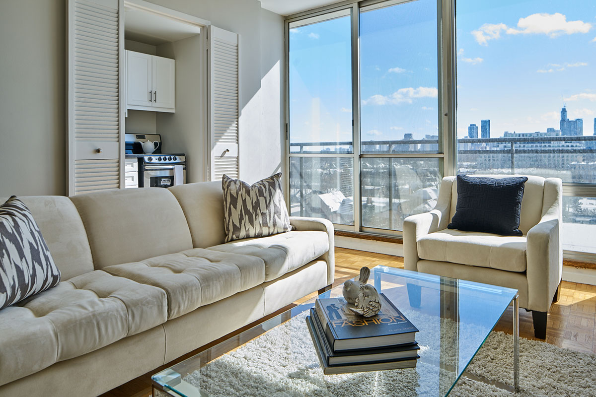 Living room with view in one bedroom apartment - The Summerhill at Yonge & St. Clair