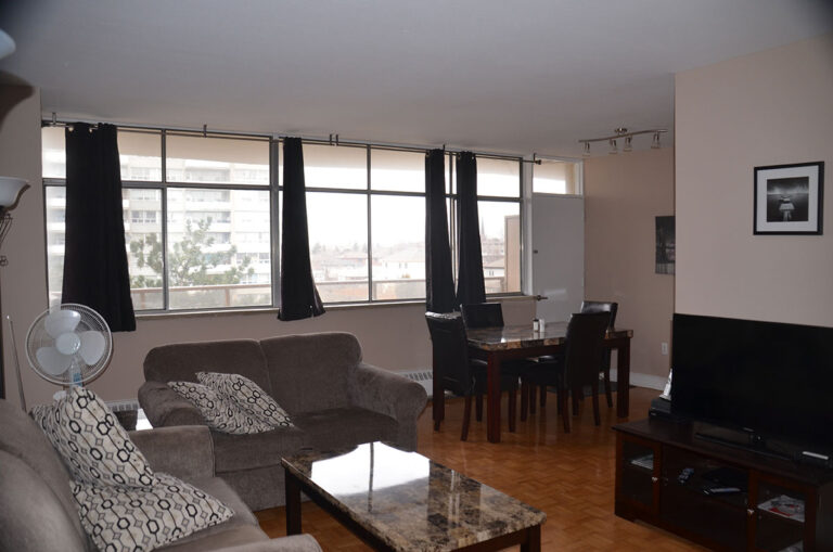 Open living & dining space in three bedroom apartment - Humber River Apartments near Keele & Wilson