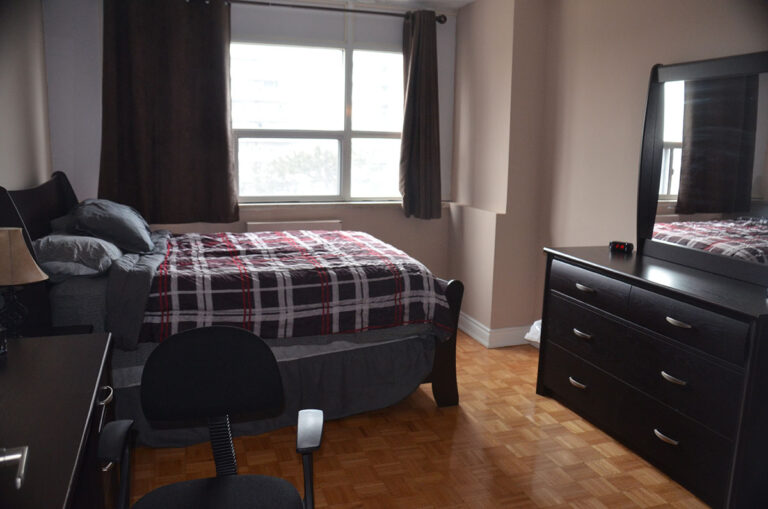 Bright bedroom in three bedroom apartment near Keele & Wilson - Humber River Apartments