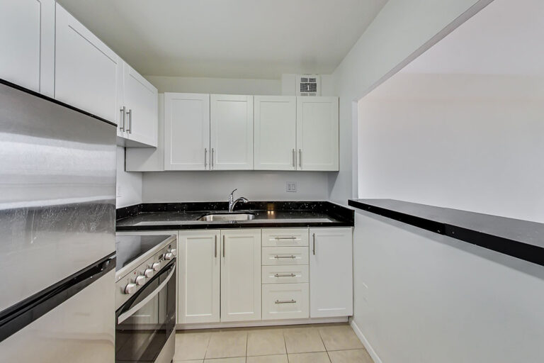 Modern kitchen in jr. one bedroom apartment - The Summerhill at Yonge & St. Clair